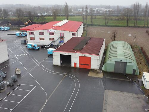 Magazijn en buitenruimte en kantoor in industriezone Ringvaart - Durmakker in Evergem